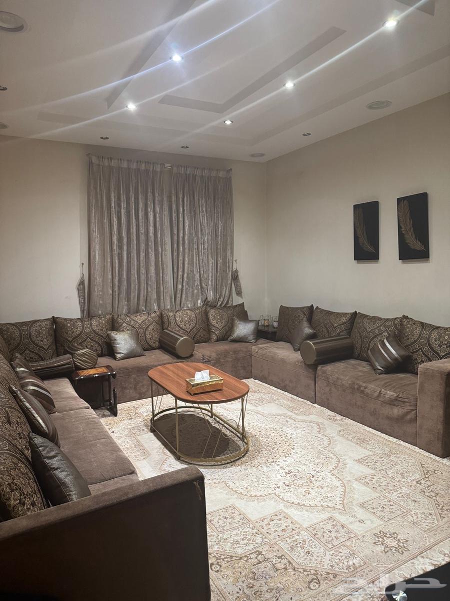 Sofa set with table, curtains, and chandelier for sale64557782348675110