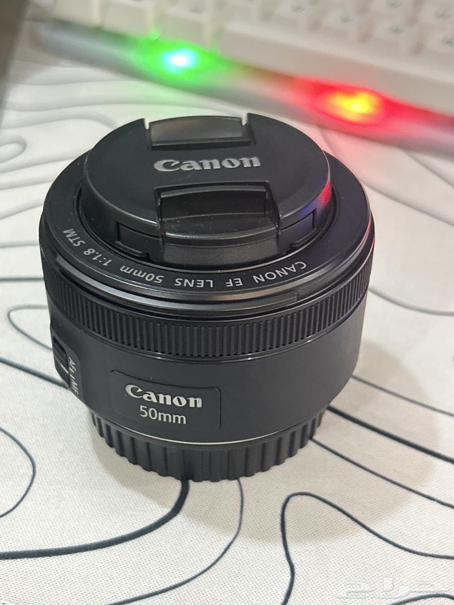 عدسة كانون 50mm نظيفة جد ا64553398234754110