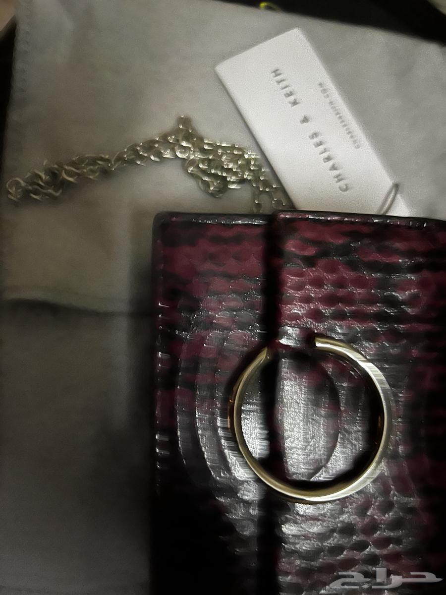 شنطة صغيرة وبوك64557920632706110