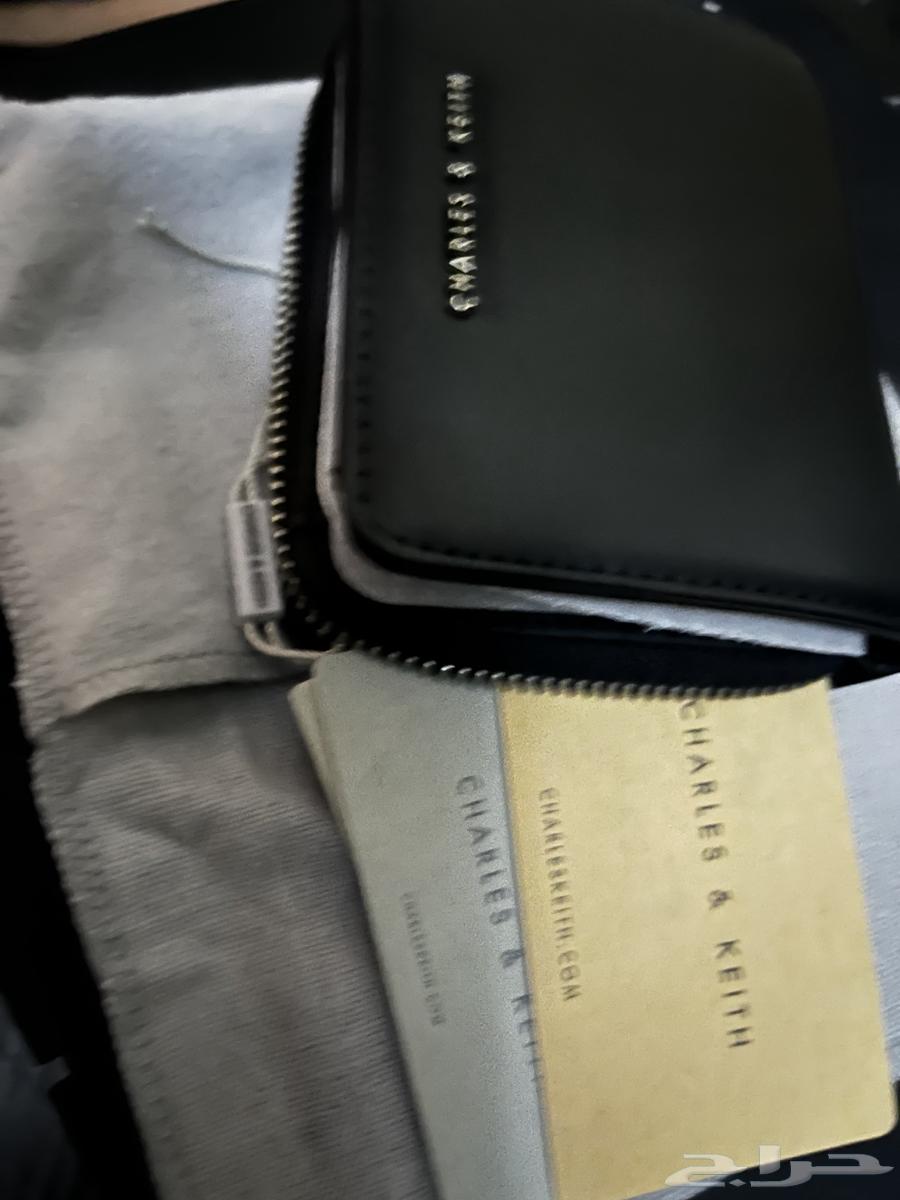 شنطة صغيرة وبوك64557920632706114