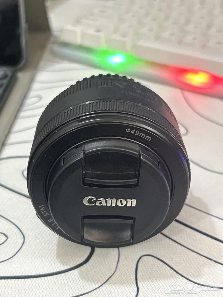 عدسة كانون 50mm نظيفة جد ا64553398234754111