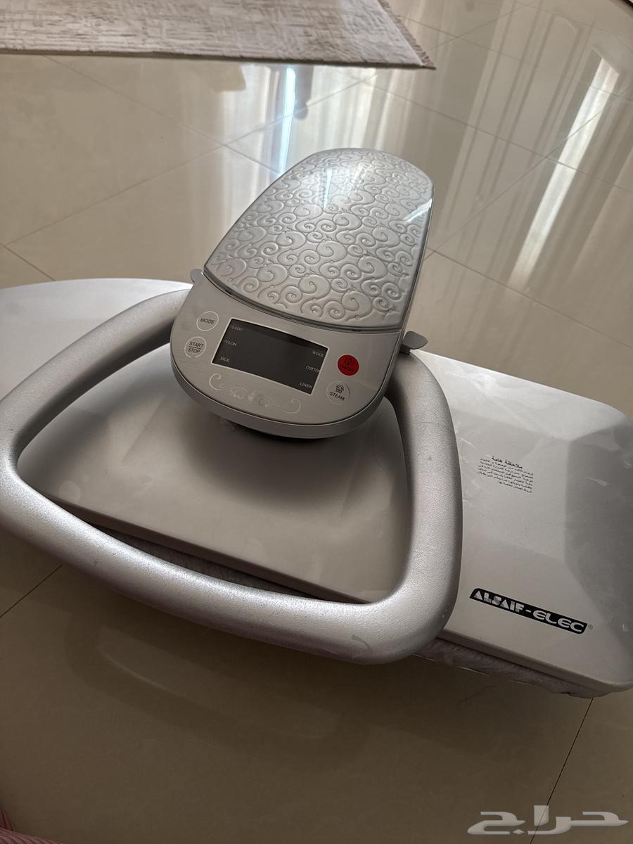 مكواة كبس64556553973507110