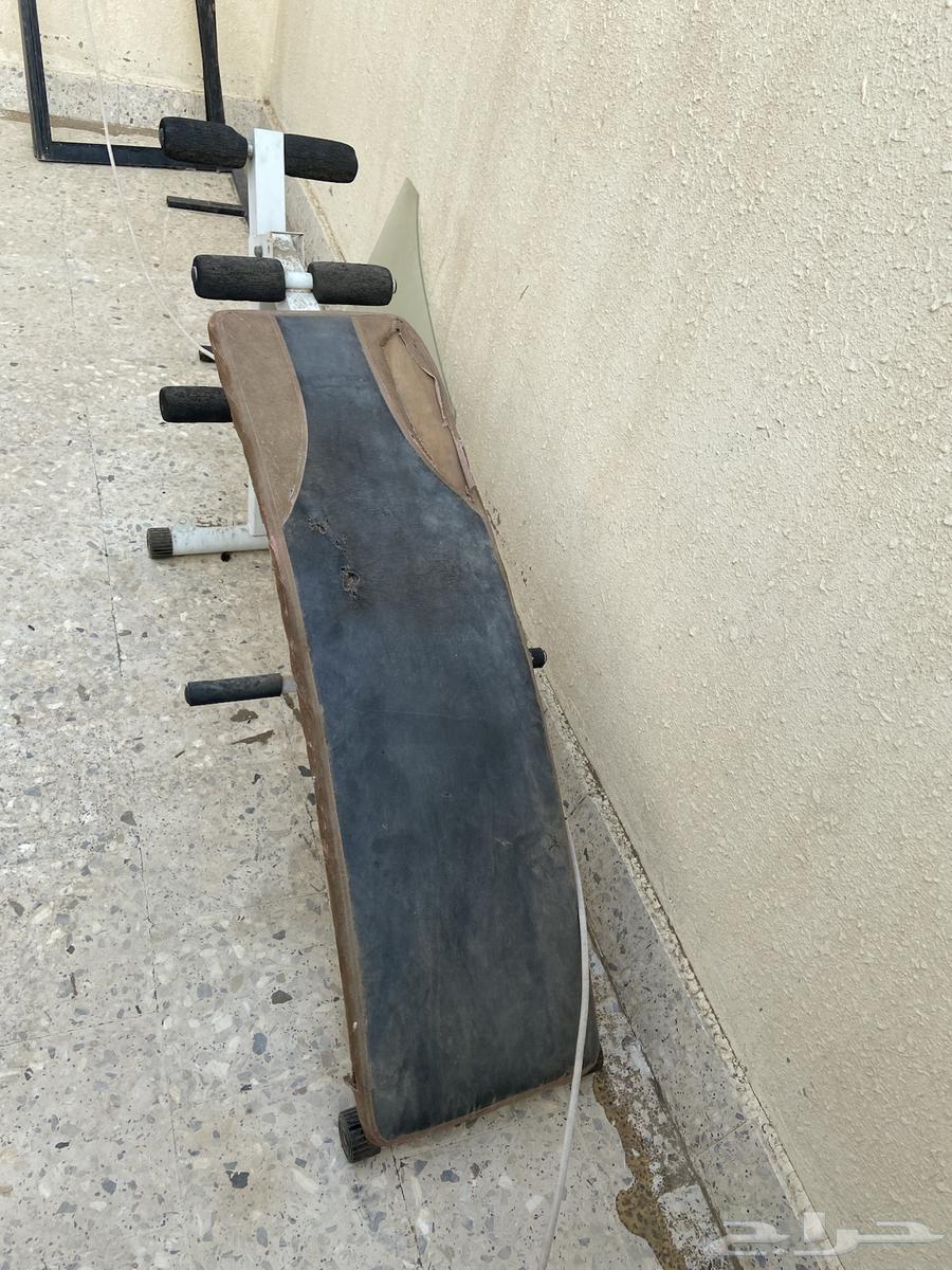 Iron and wood scrap table, bed, and devices64558155737219111