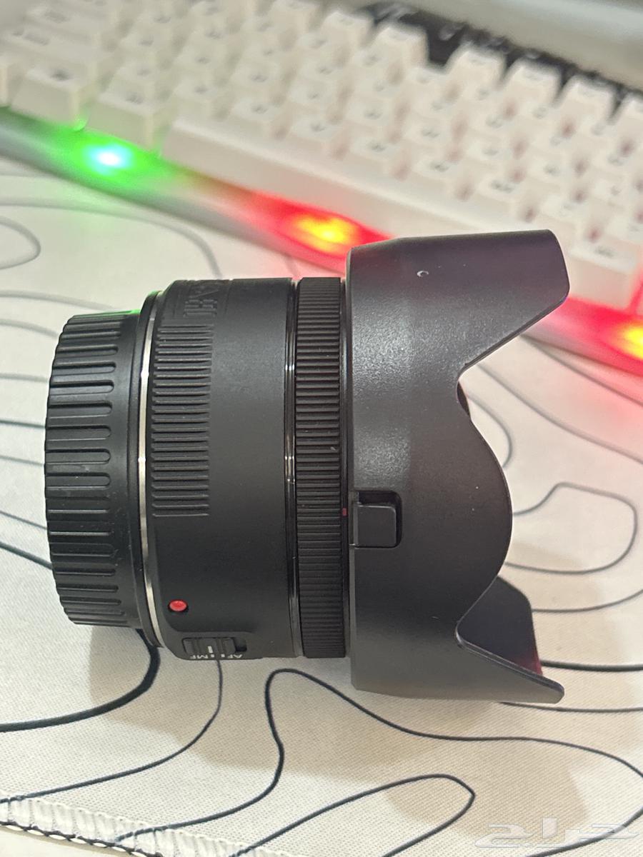 عدسة كانون 50mm نظيفة جد ا64553398234754112