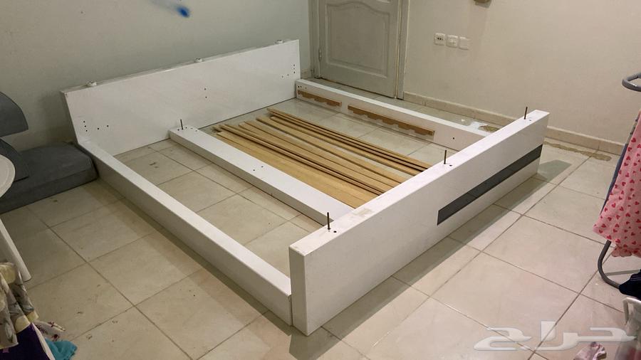 Iron and wood scrap table, bed, and devices64558155737219110