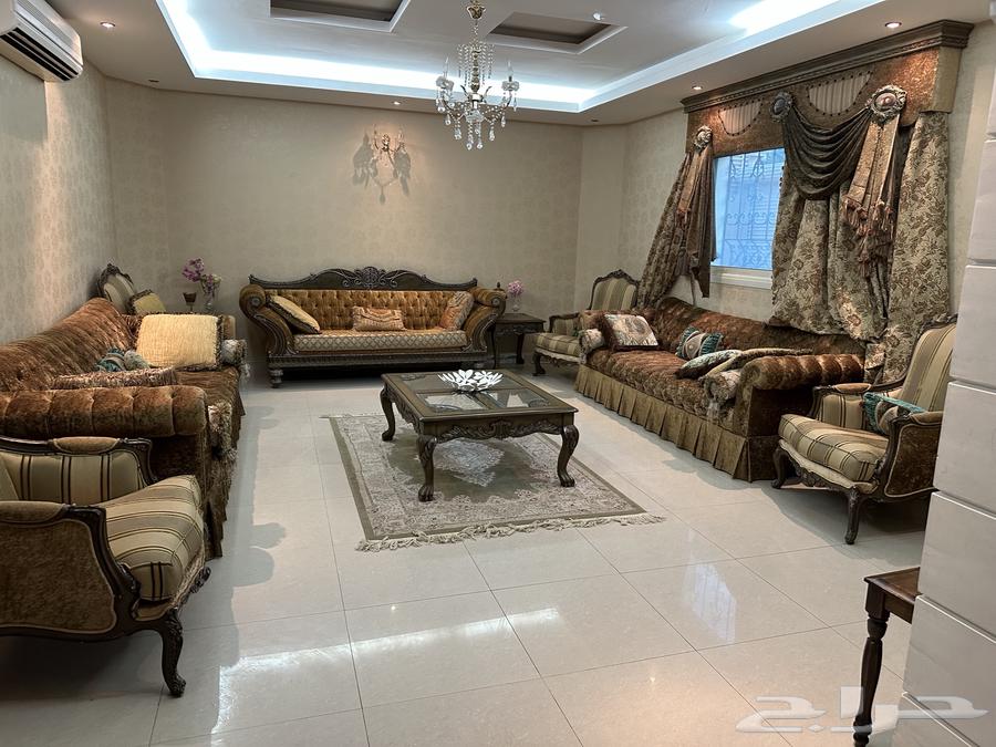 A sofa set sufficient for 12 people with tables64557044486403111