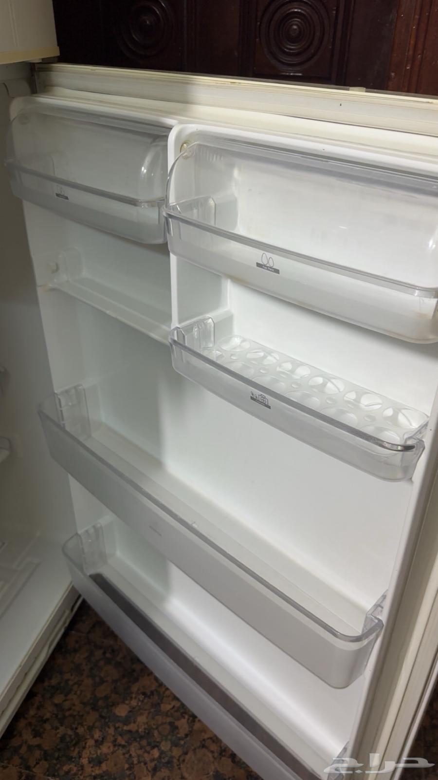 ثلاجه مع فريزر للبيع64569630768002111