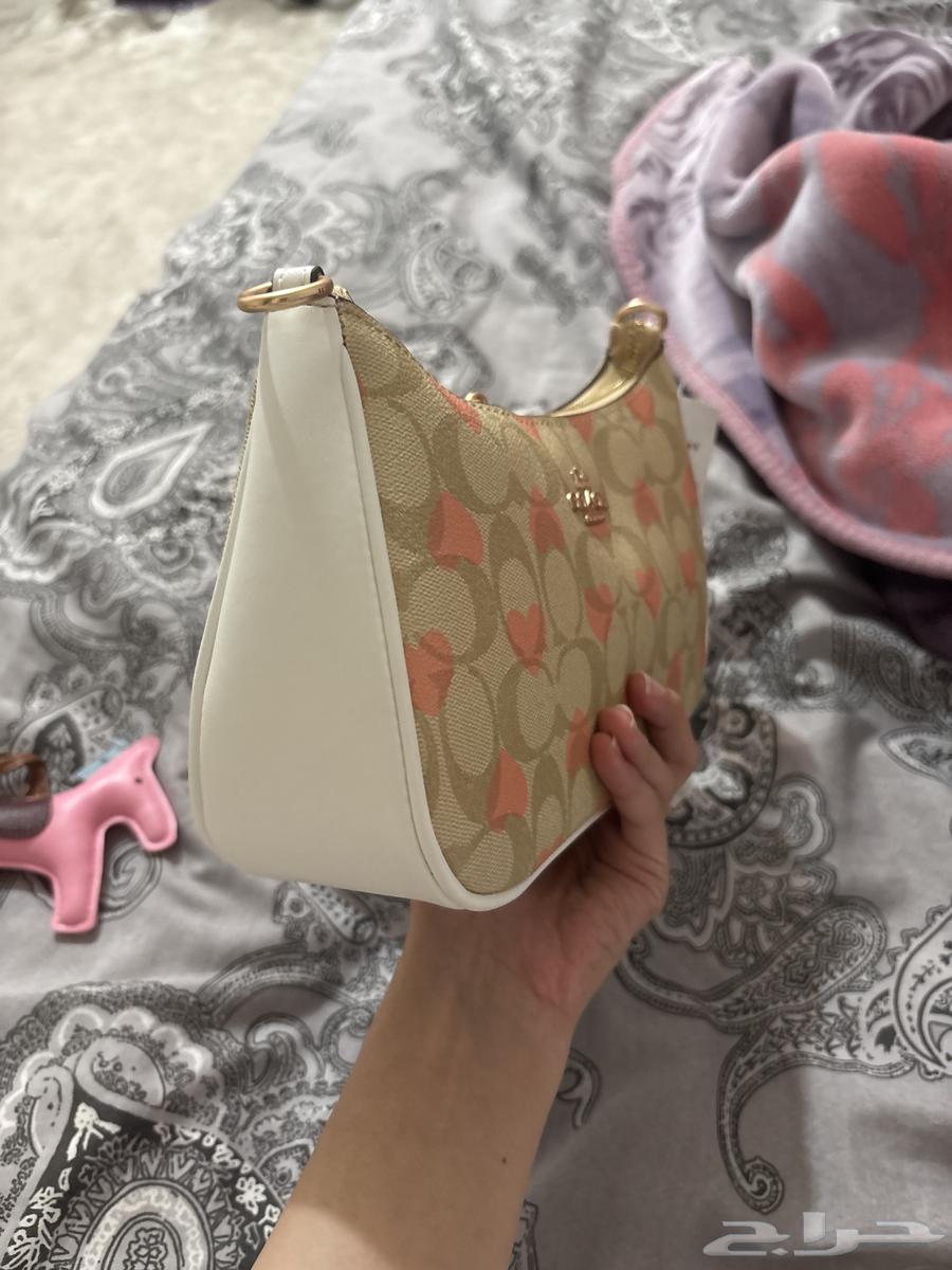 شنطة قوتشي نسائية64563688479619112