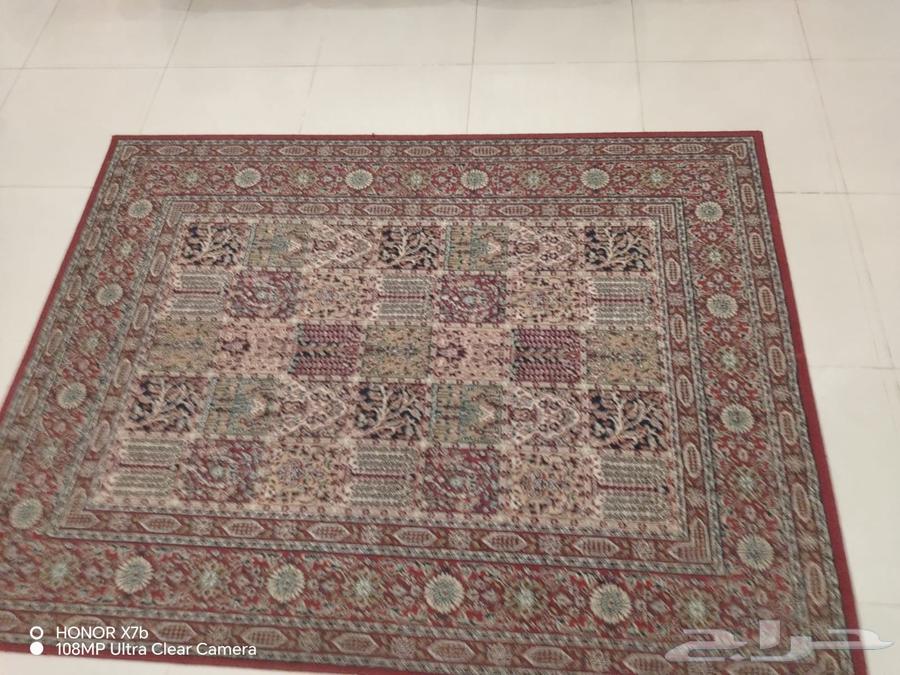 Sofa and carpet64569875574146112