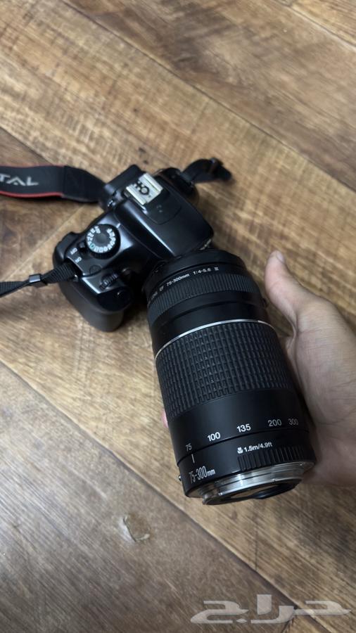 كاميرا كانون 1100D64568481458433111