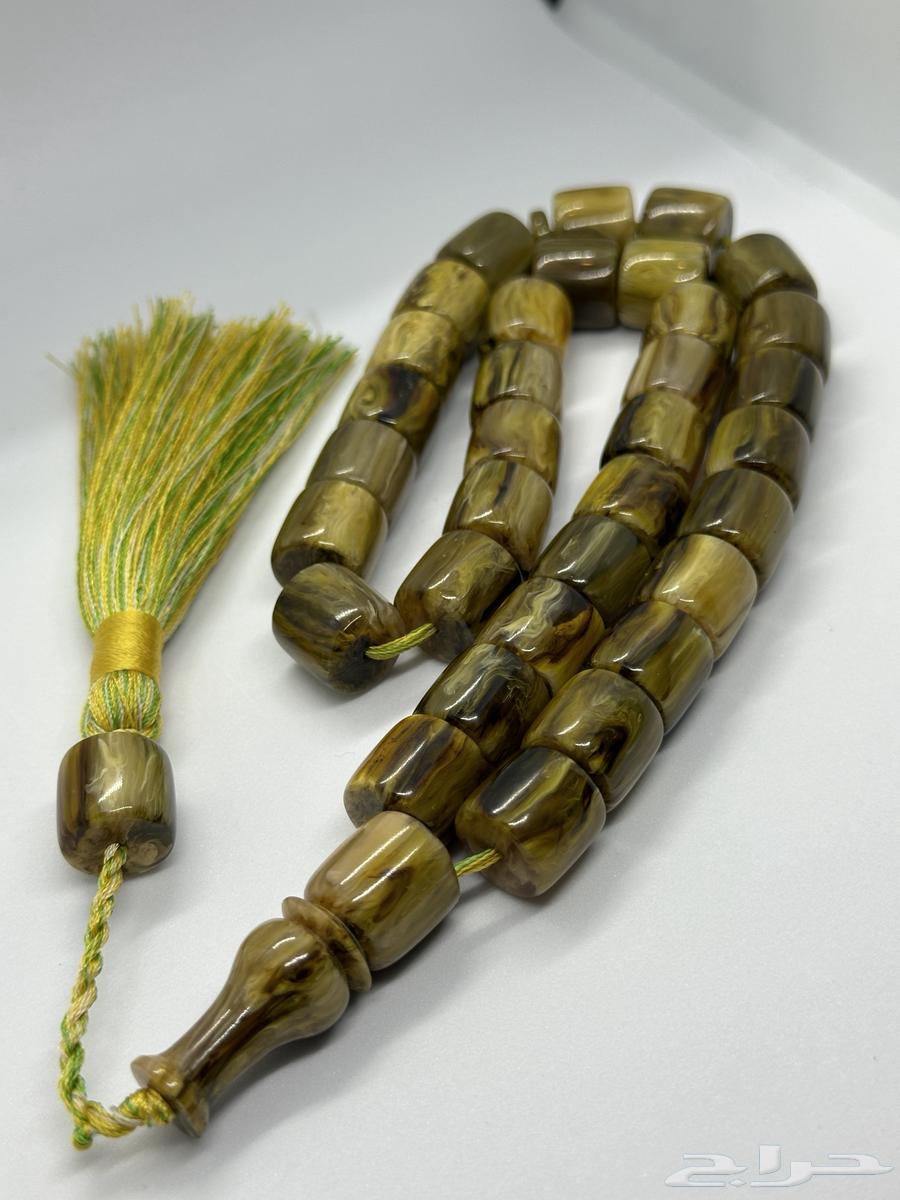 عرض اليوم الوطني خاتم ومسباح64573657266563114