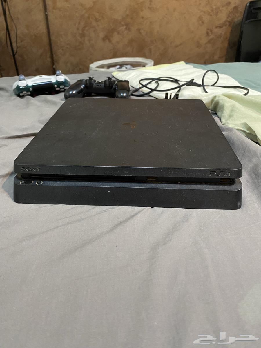 Sony 4 Slim with two controllers 300 (one controller has a non-working button)64575587305986111