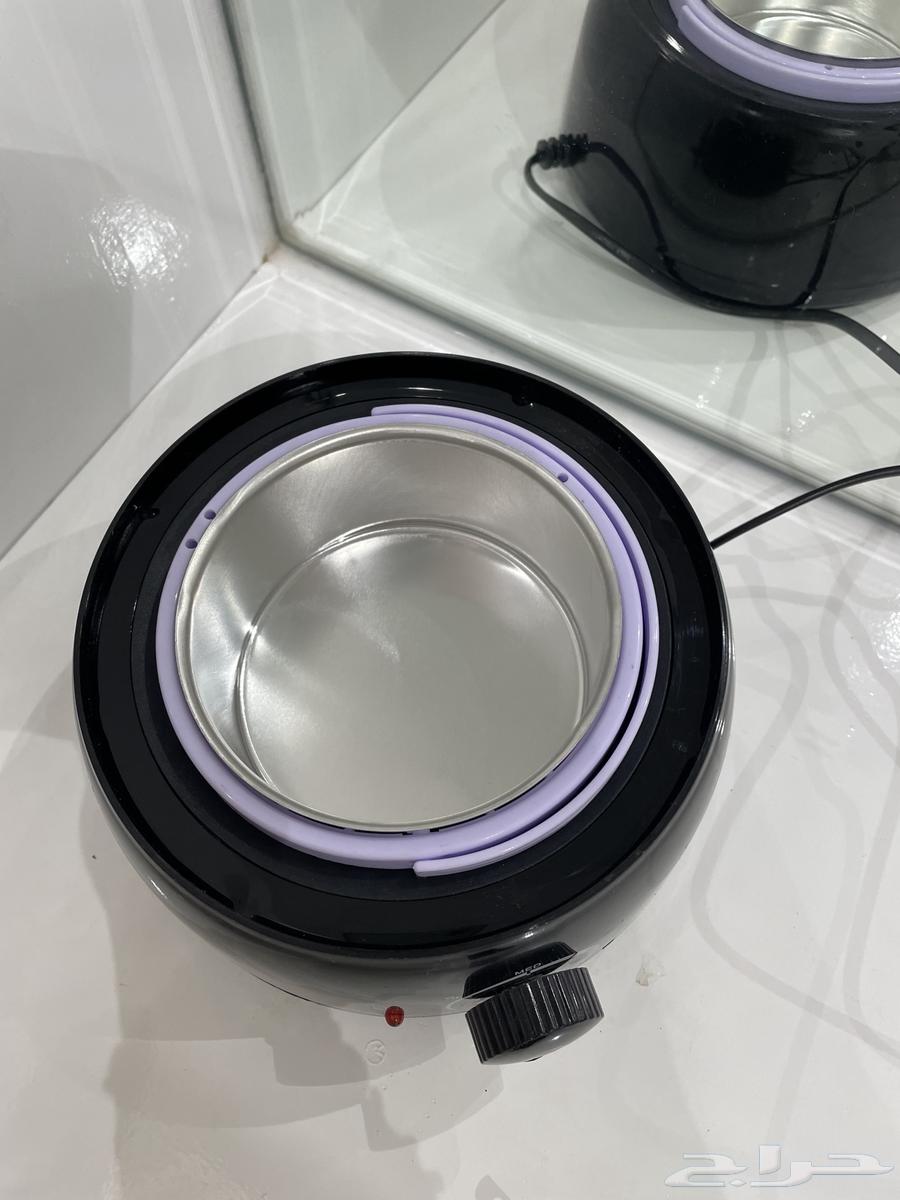 جهاز تذويب الواكس64578089824642110