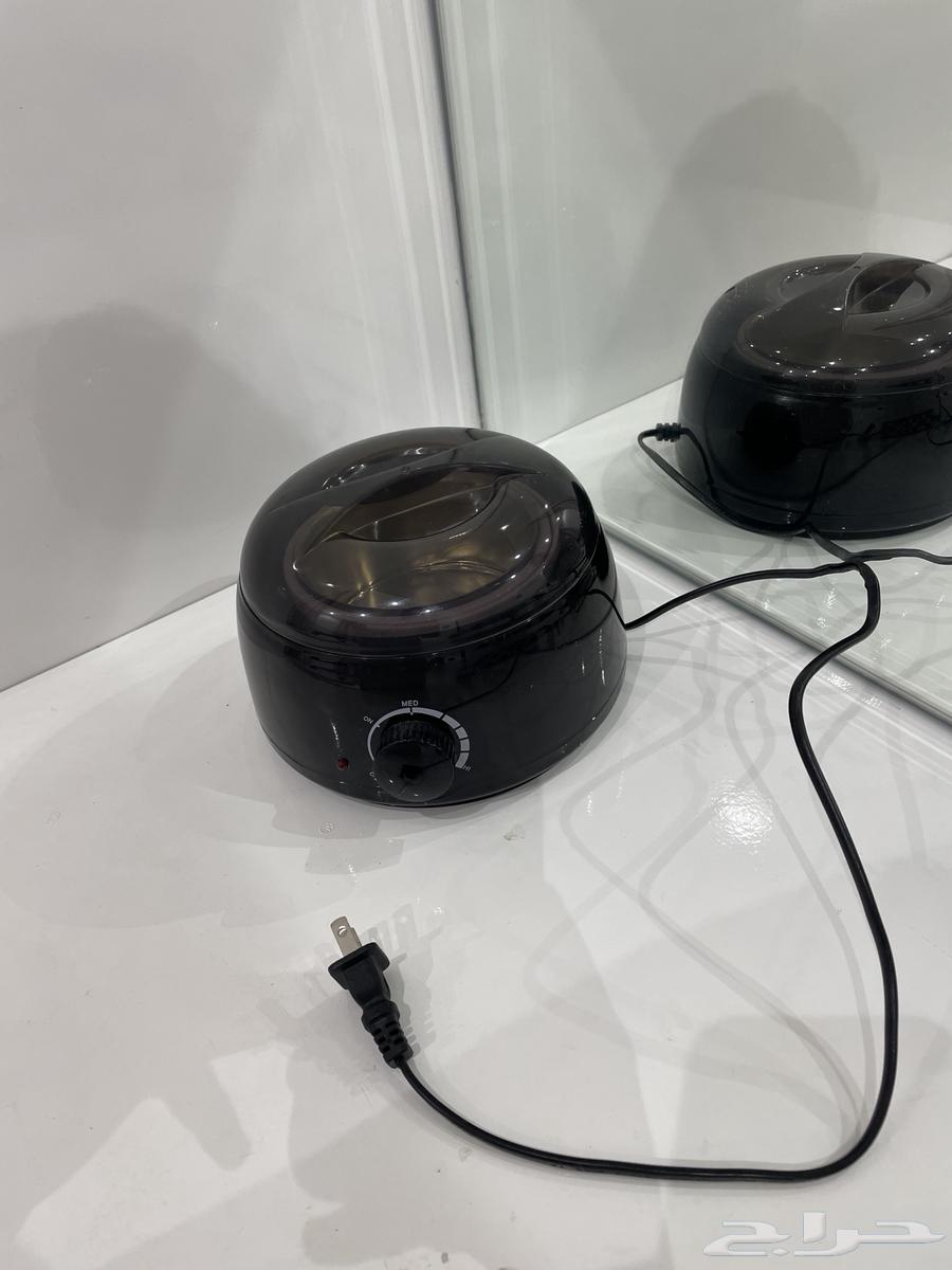 جهاز تذويب الواكس64578089824642111