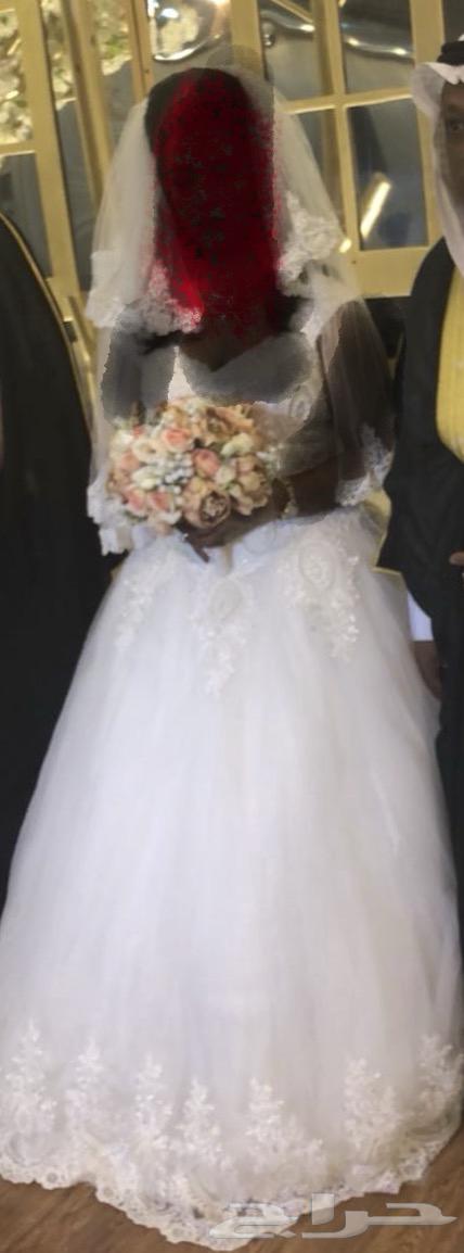 فستان زواج وطرحة وعباية بيضها تستخدم بعد الخروج من زفاف64577908127361111