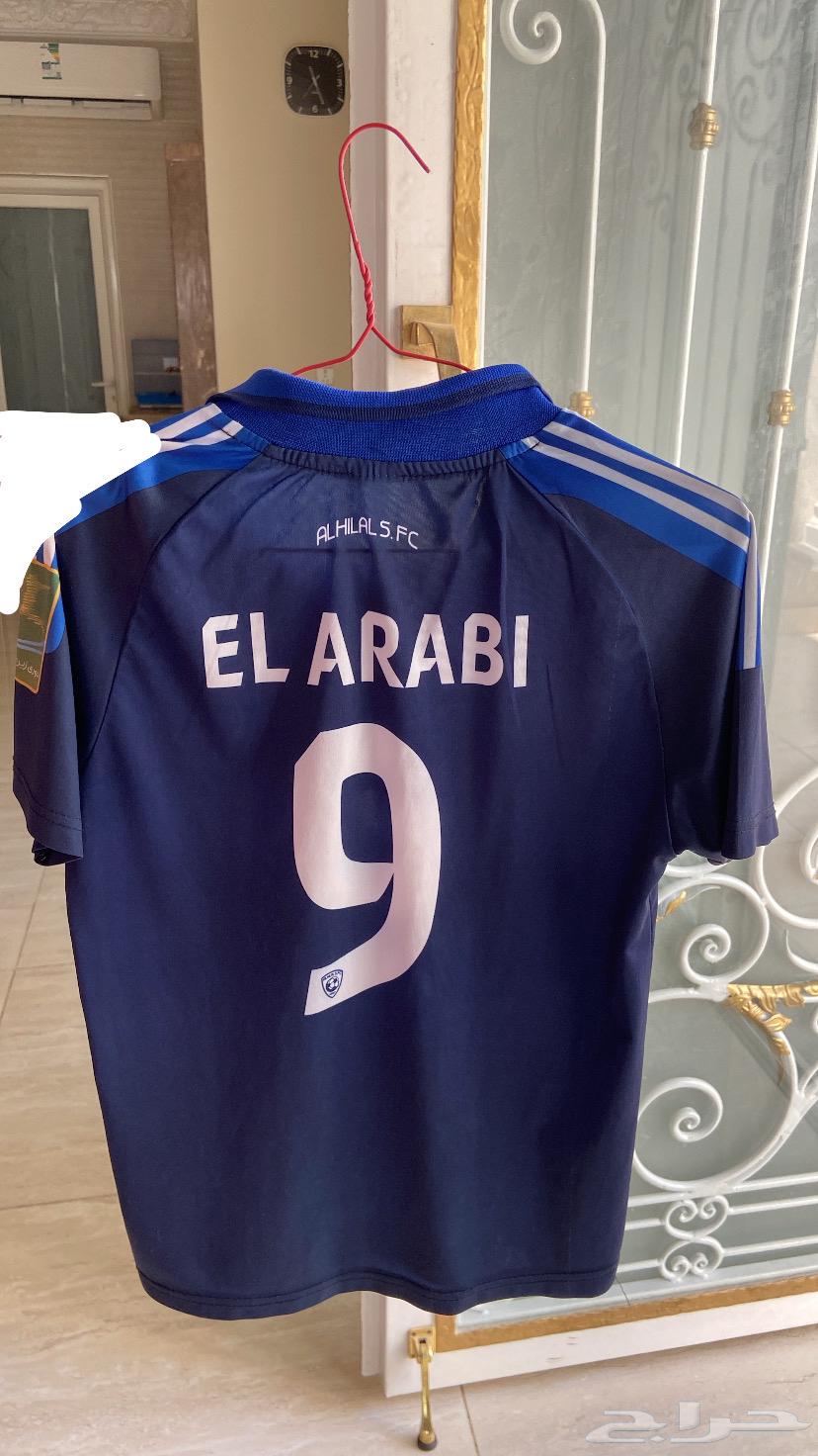 تيشرت يوسف العربي طقم الهلال 2011 ( ماني متاكده اذا اصلي)64574103005441110