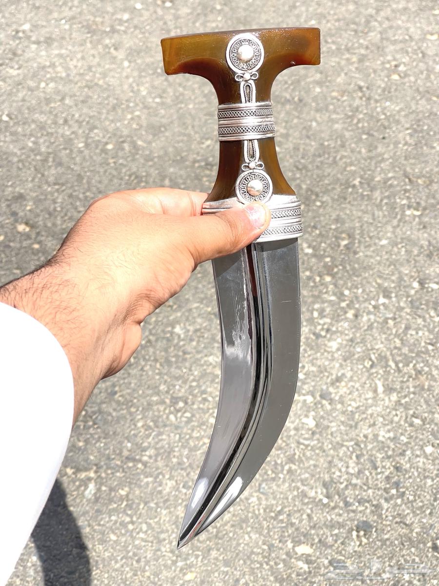 خنجر قرن طبيعي احمر صب المدني64585943110146112