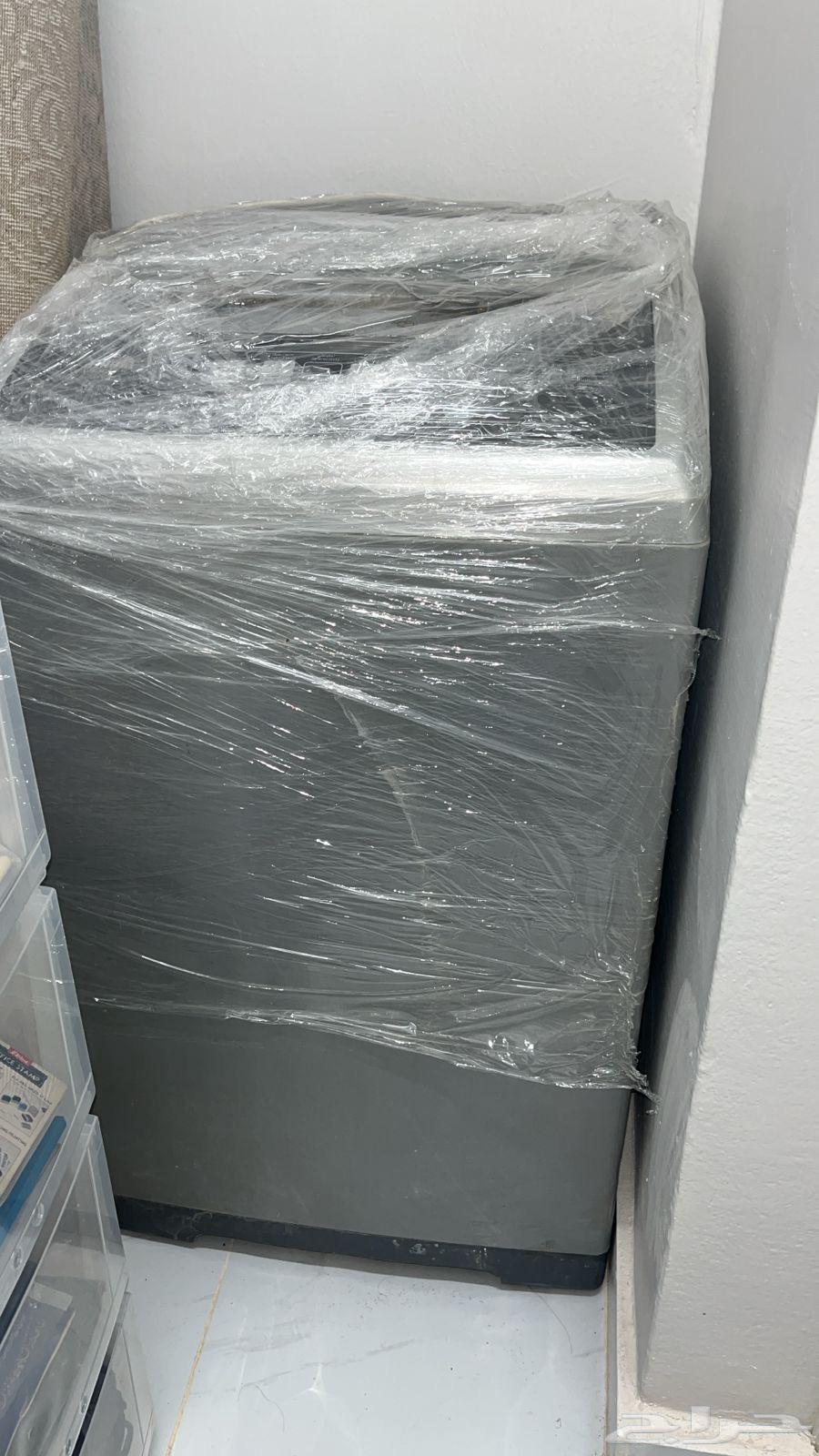 غسالة ملابس وطاولة شاشة64583078197250111