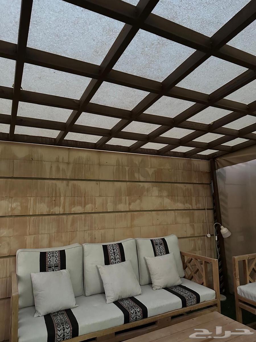 Outdoor seating set with umbrella, table, and grill64585380704898113