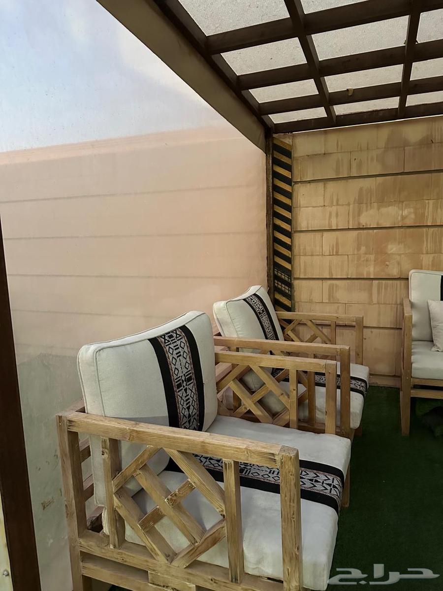 Outdoor seating set with umbrella, table, and grill64585380704898112