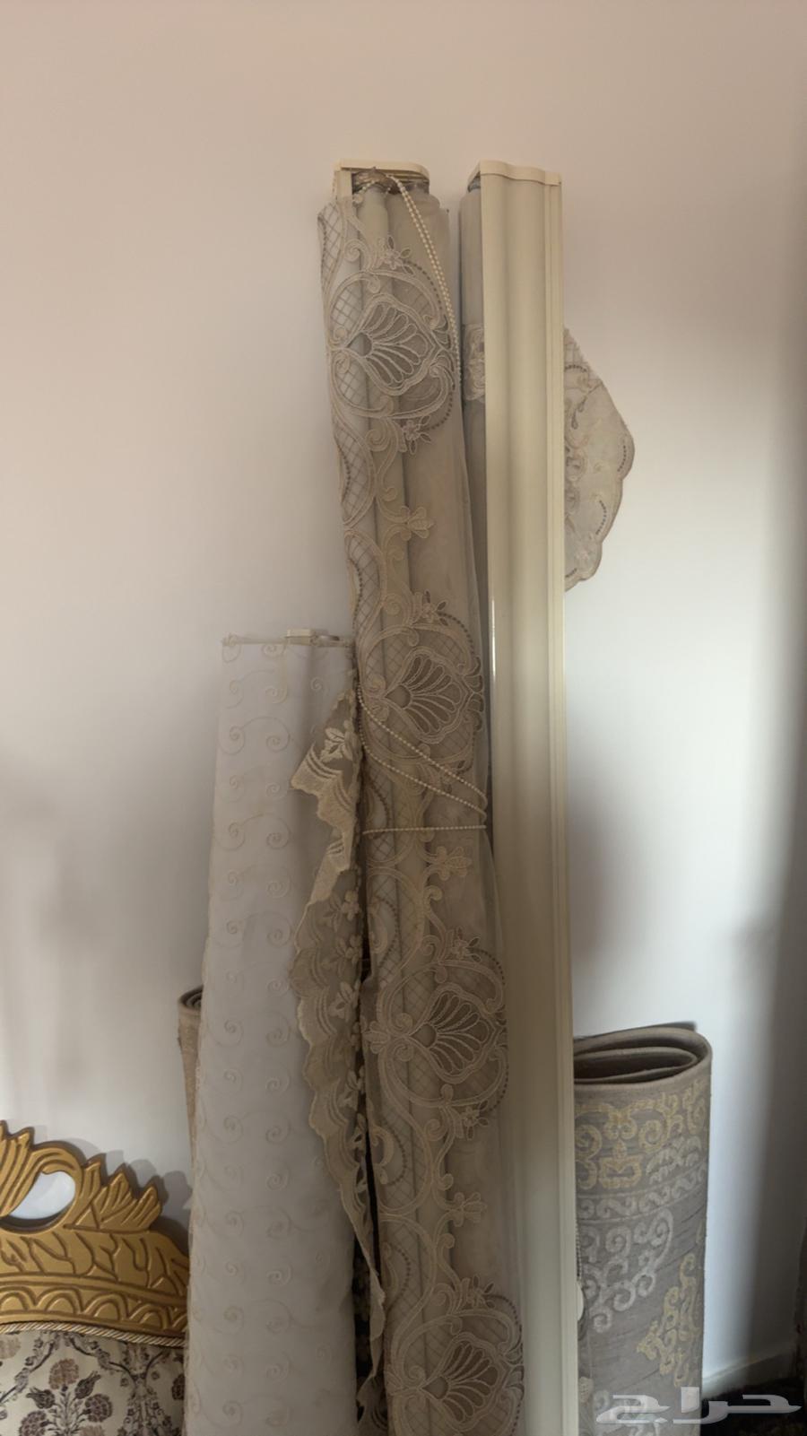 Supports with mats and curtains size 4 by 12 and a living room table64595366738945112