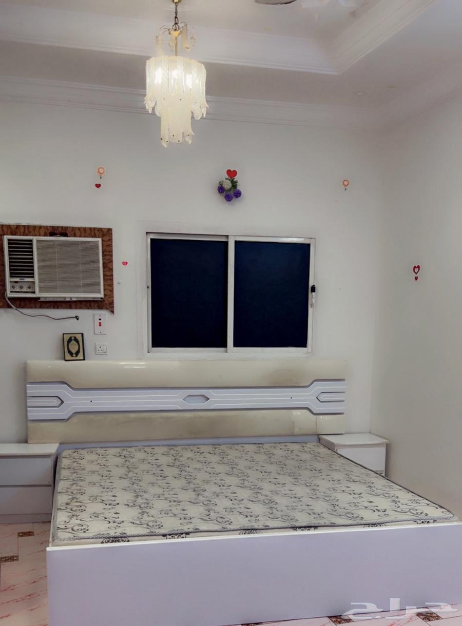 Cinnamon color cabinet with bed and styling table64593059182722112