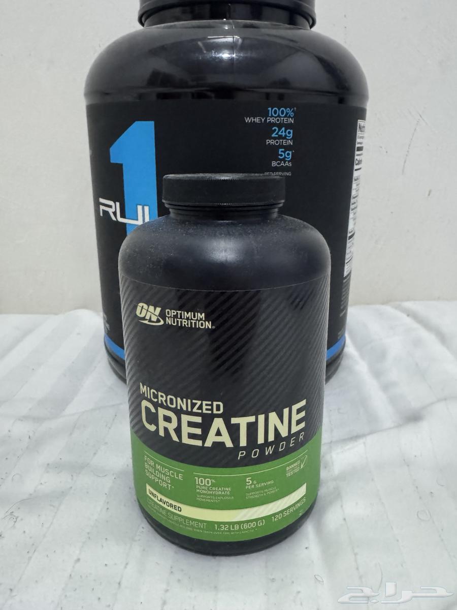 Protein with two creatines, one unflavored and one berry-flavored64588347476866111