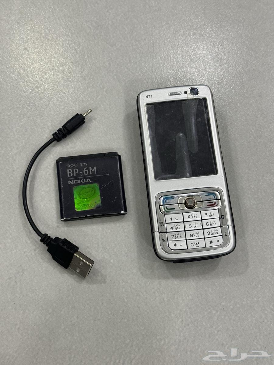 Original Finnish Nokia N73 mobile phone with telecom sticker, clean64589804937986110