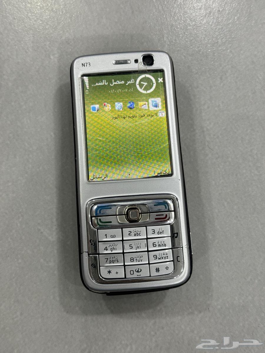 Original Finnish Nokia N73 mobile phone with telecom sticker, clean64589804937986111