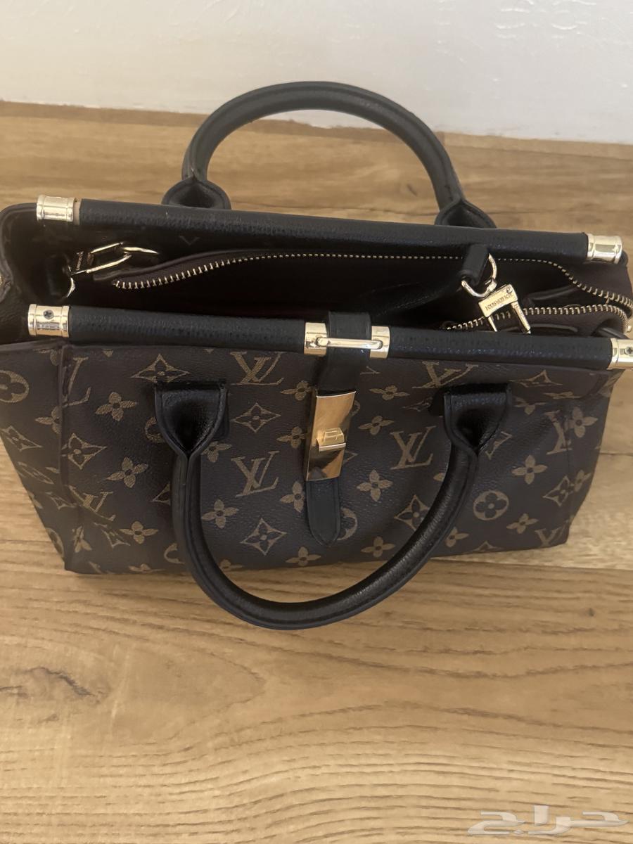 شنطة يد64590971542275110