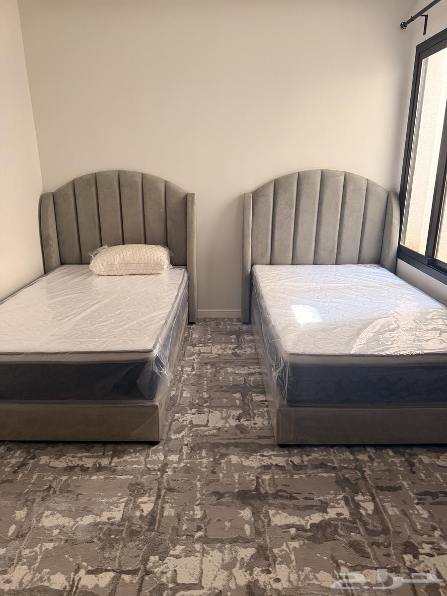 Children's bedroom with two beds, wardrobe, and drawer unit64591912676097110