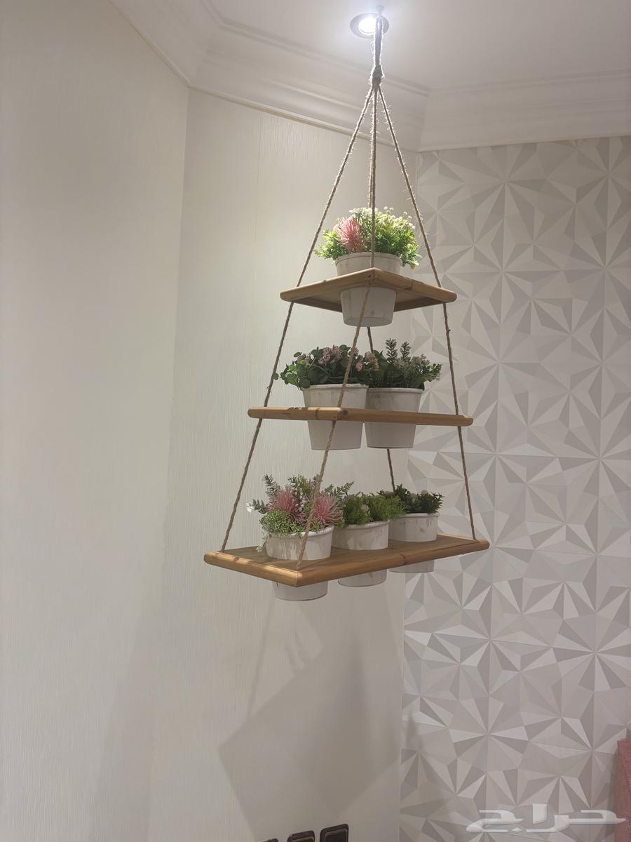 White corner shelf with wooden hanging shelf with ropes to hold flower pots64442843835650111