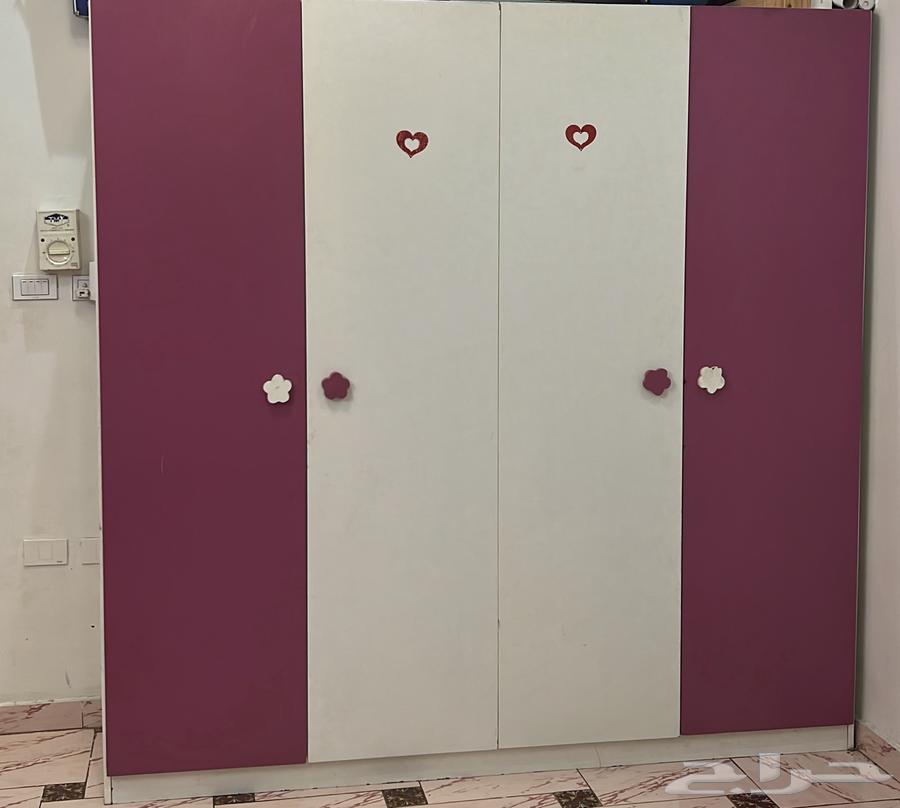 Cinnamon color cabinet with bed and styling table64593059182722110