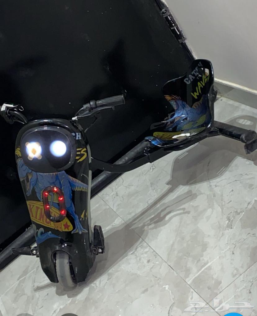 سكوتر لون اسود ديناصور64588806511746111