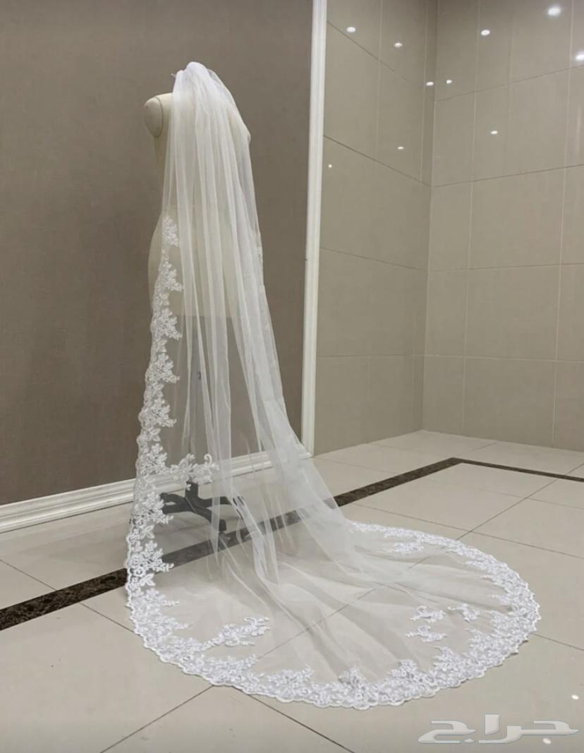 فستان زفاف ابيض . طرحه عروس ابيض . مسكة ورد ابيض64592529051523112