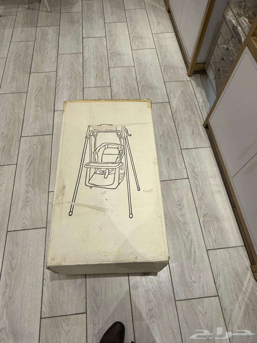 New children's swing with carton, never used64591298755074110