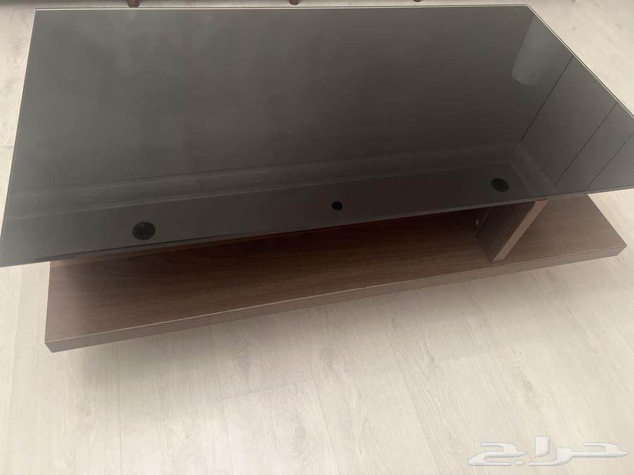 طاولة قهوه 119 65 cmاللون بني خشبي والسطح اسود زجاج 200 SR64596587818753113