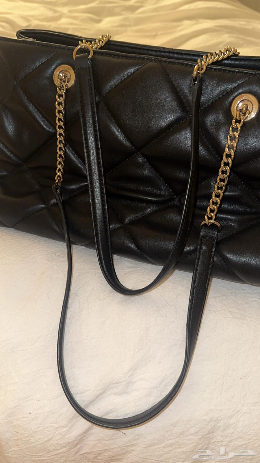 شنطة DKNY الاصليه64606319768449110