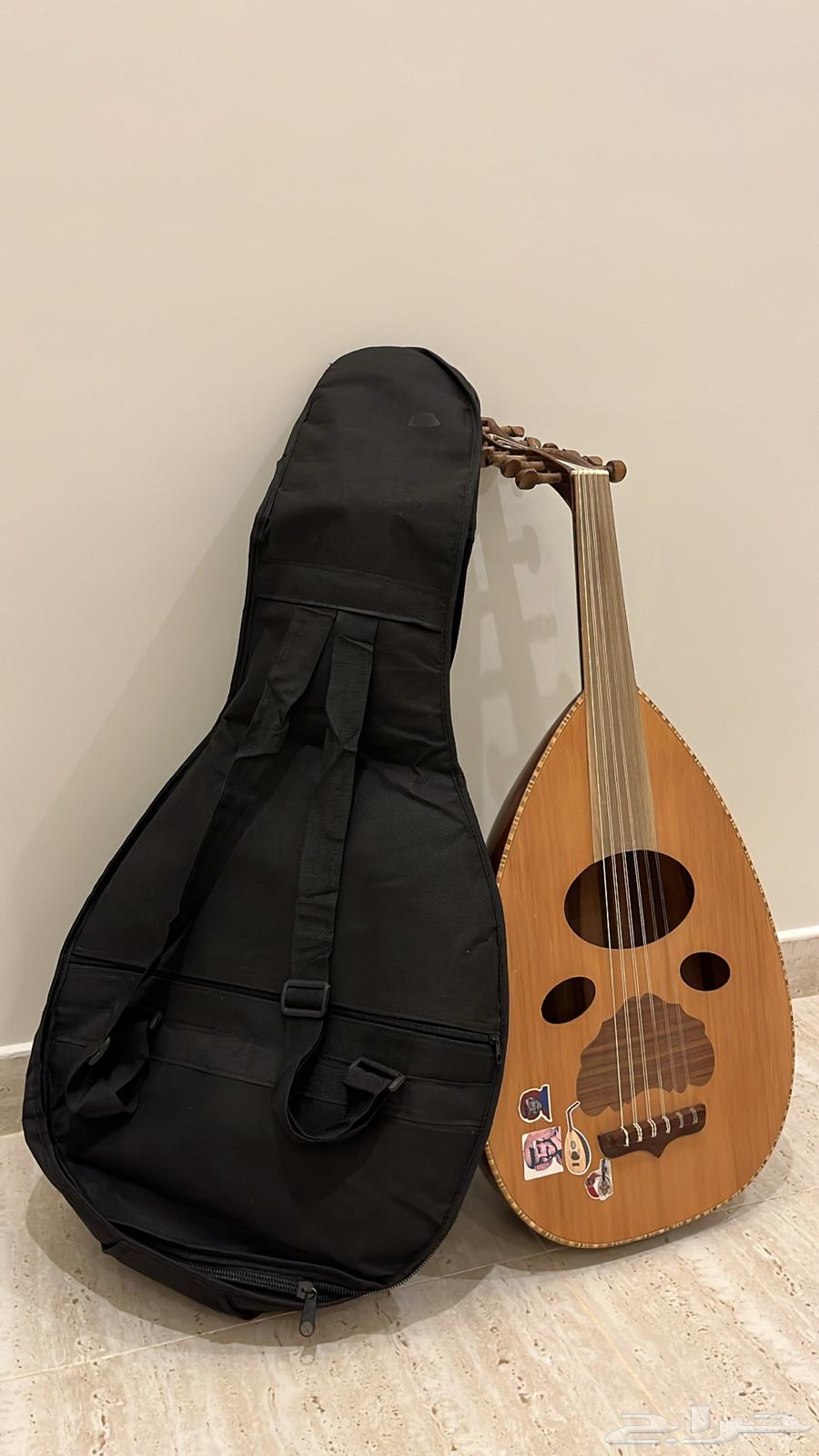 عود عراقي بشنطته وريشة64615362196610110