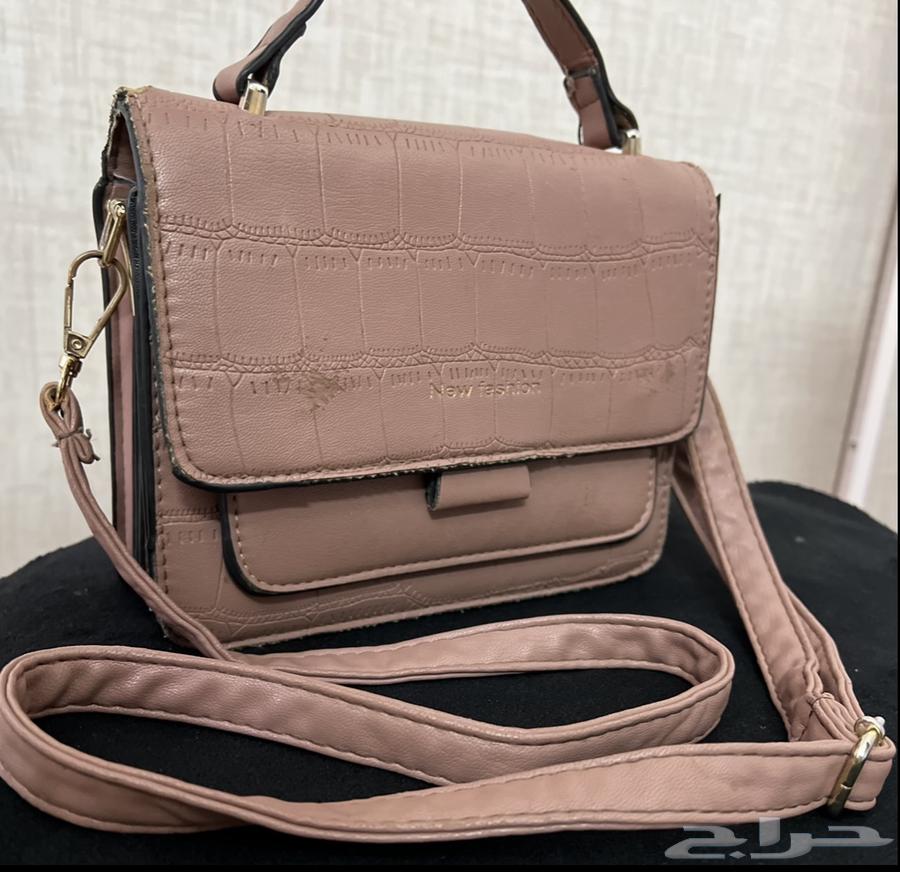 شنطة يد نسائية جديدة (أبها)64607172176130110