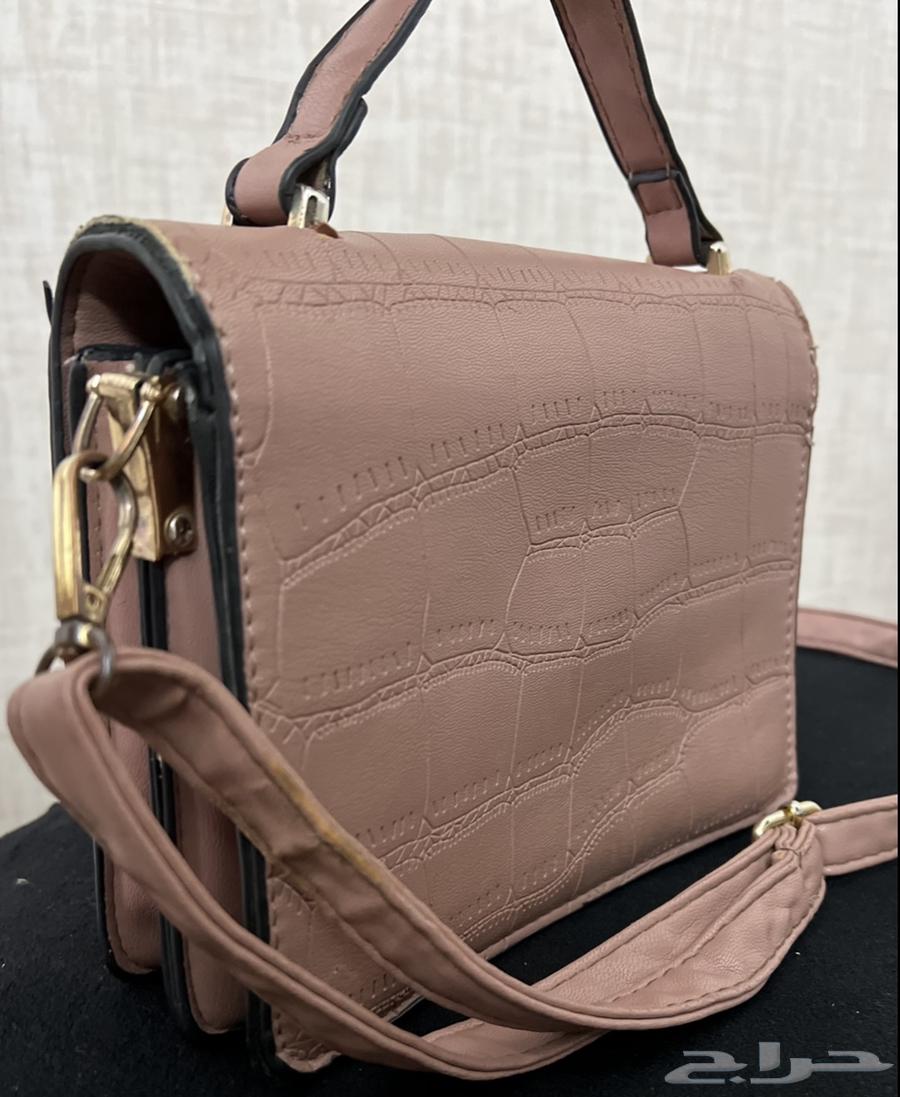 شنطة يد نسائية جديدة (أبها)64607172176130111