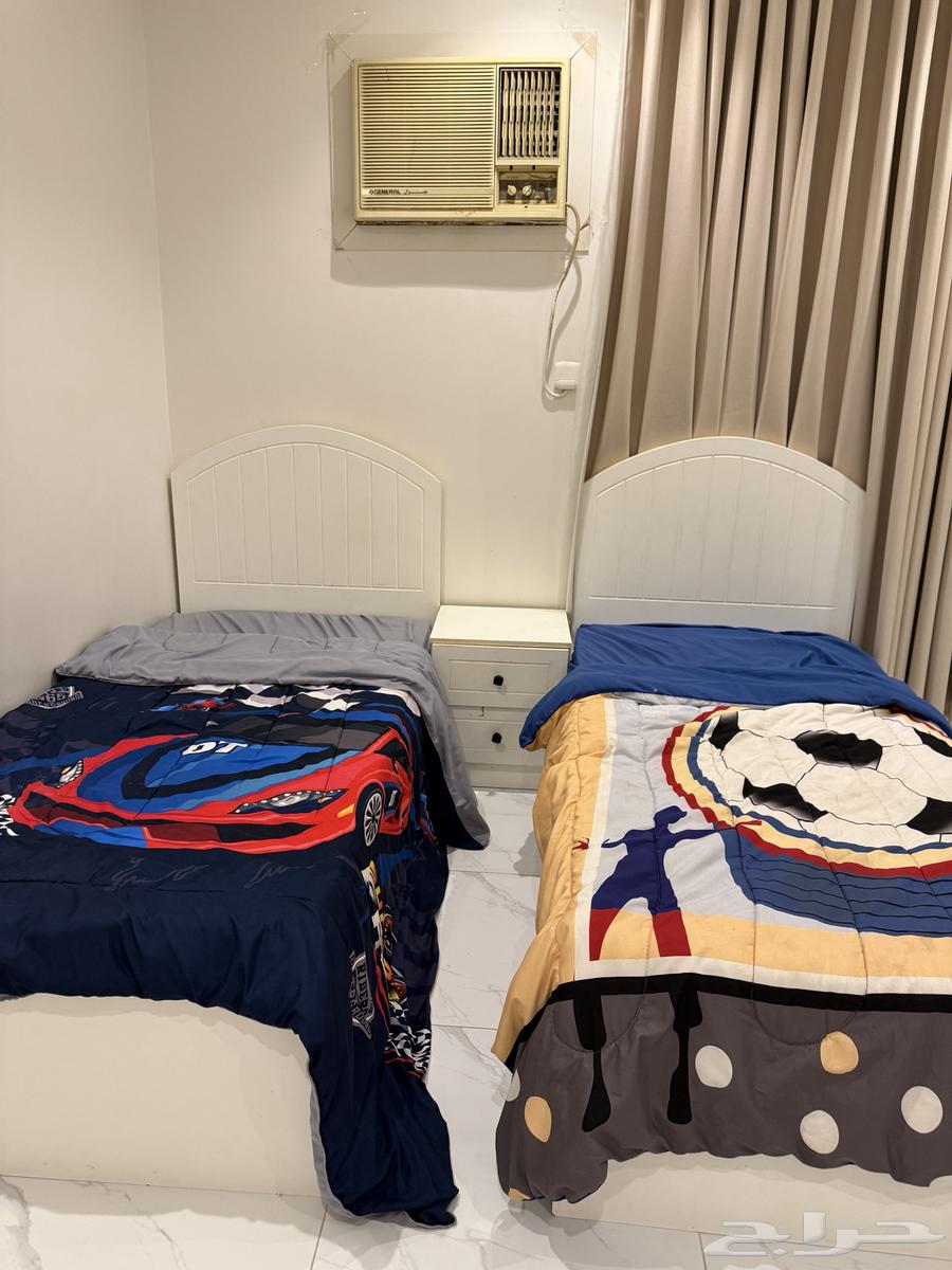 Two single beds with clean mattresses and two nightstands for sale64606204446338110