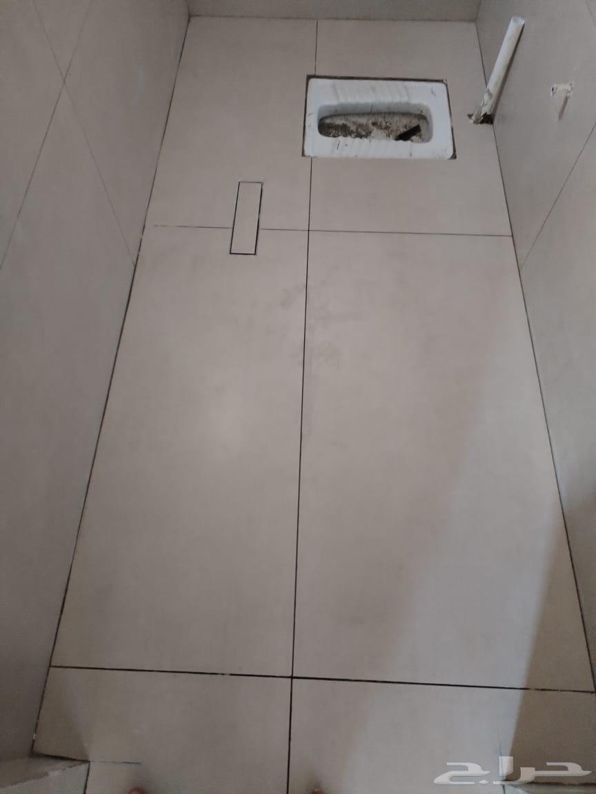 معلم يمني لتركيب البلاط64159493333635113