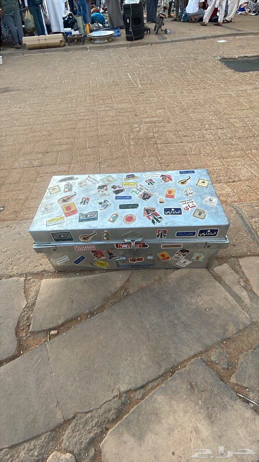 An old metal box with stickers on it64616852717699110