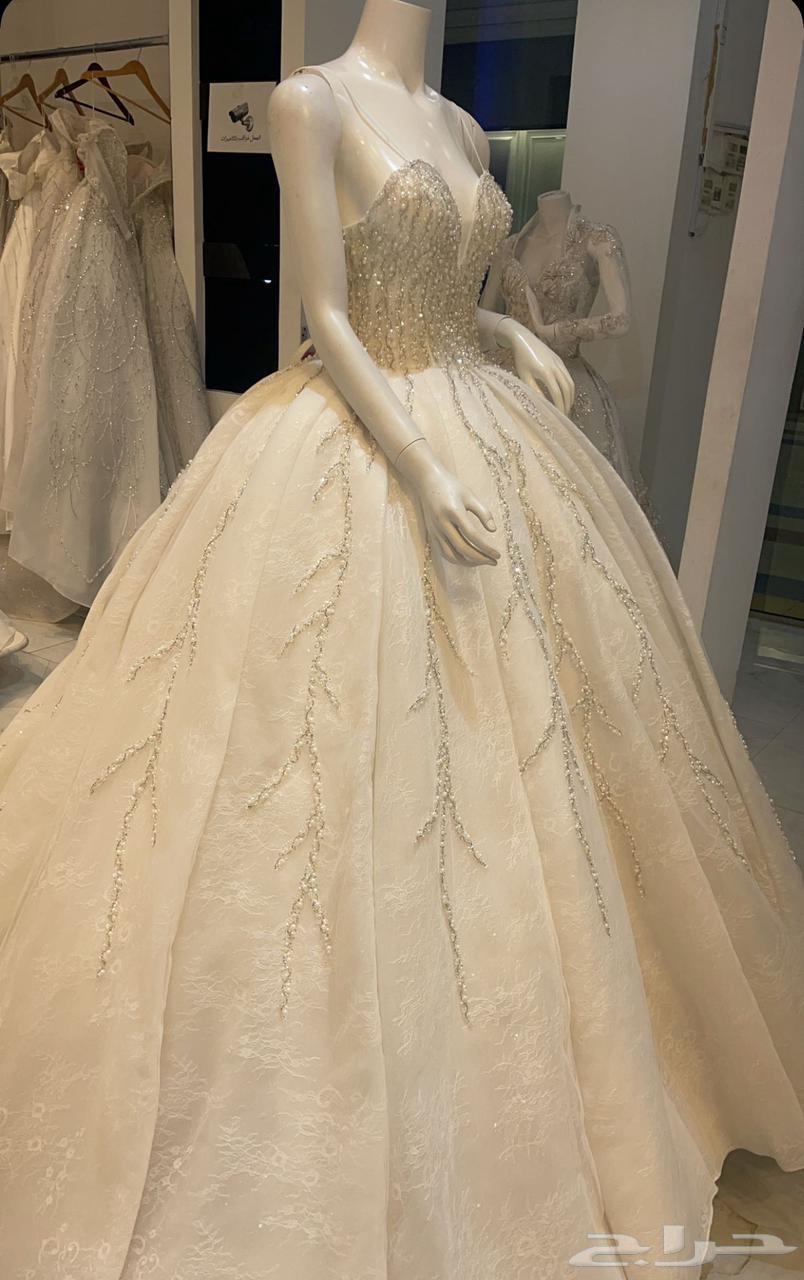 فستان زفاف شبه جديد مع طرحه طويله بدون جيبون64625062886402110