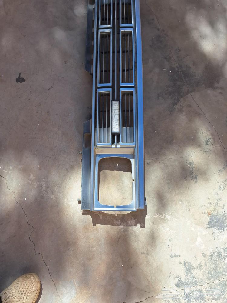Original Datsun 89 grille with Nissan seal63616465363586112