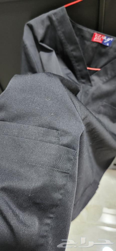 Black medical scrubs set by Izari, size XL63278588954754112
