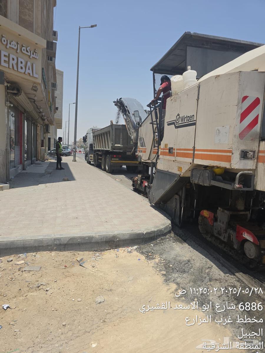 Asphalt scores deliver road marking, adding road studs, paving64166232349827114