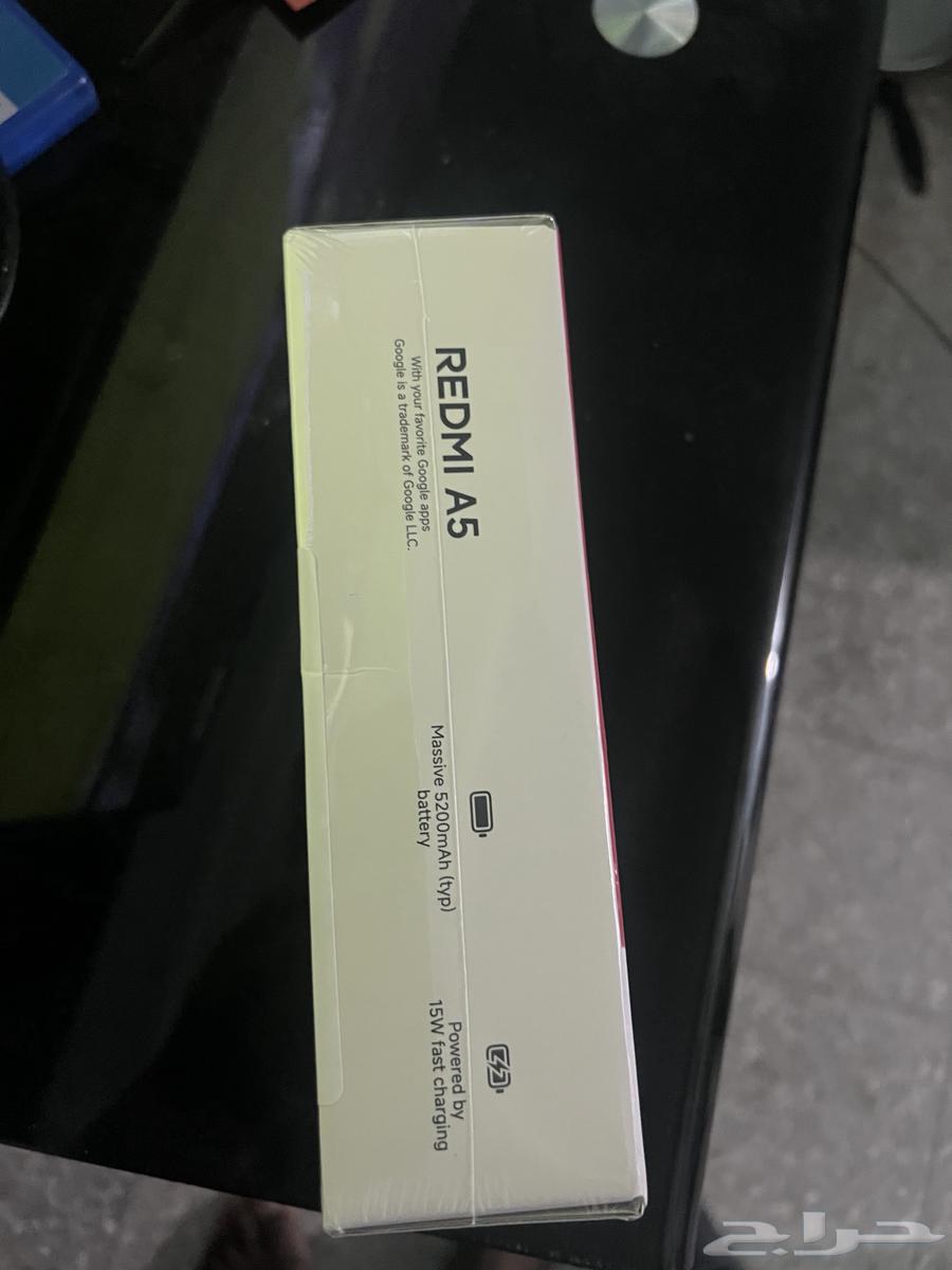 ايفون 12 برو وجهاز ريدمي A564657288383235113