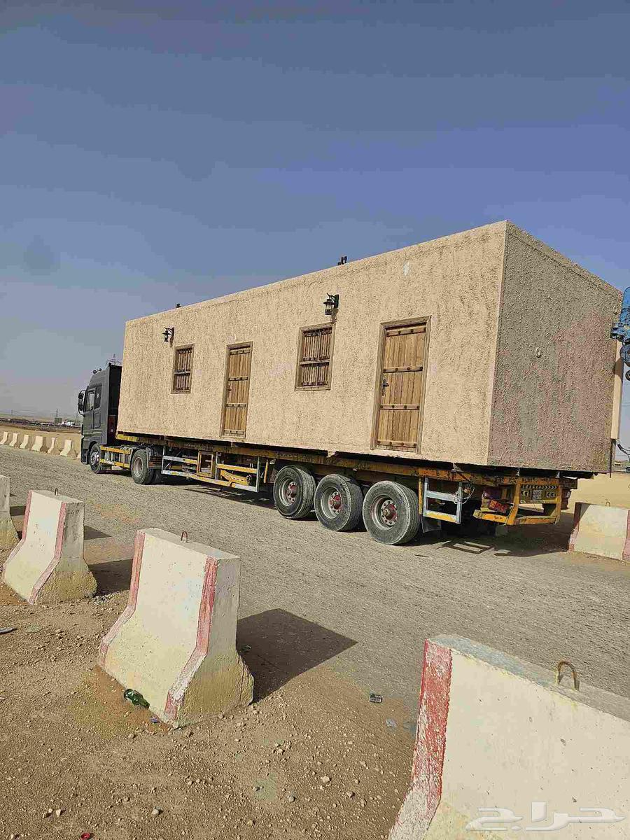 Transport of trailers, flatbeds, and cranes for moving caravans64164768403586114